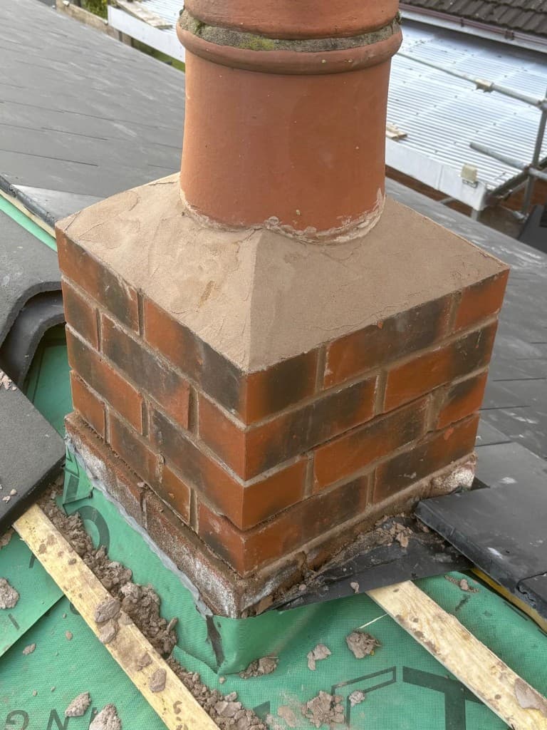Chimney stack and roof junction repair work by Cooper Roofcraft in Greater Manchester