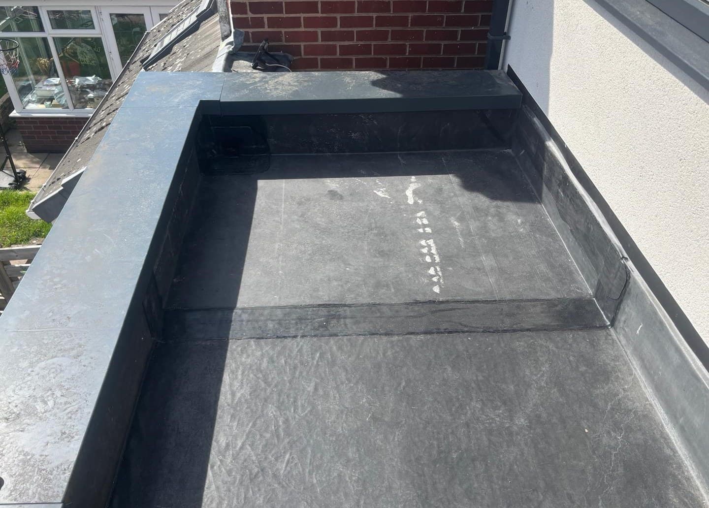 EPDM rubber flat roof installation detail domestic extension Greater Manchester