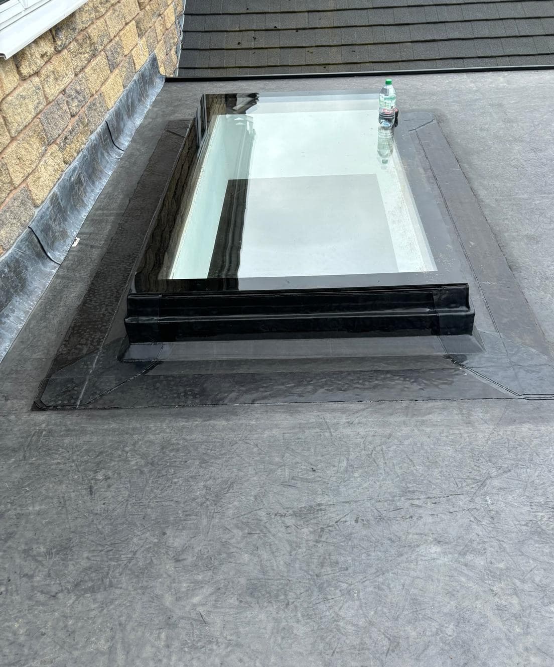 Flat roof with glass skylight and lead flashing Cooper Roofcraft Manchester area