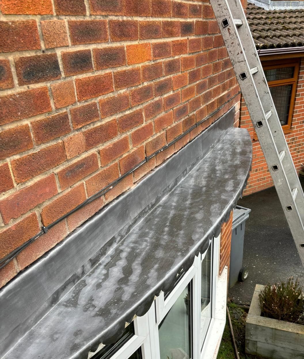 Lead bay roof and flashing on brick house domestic roofing Bury Manchester Cooper Roofcraft