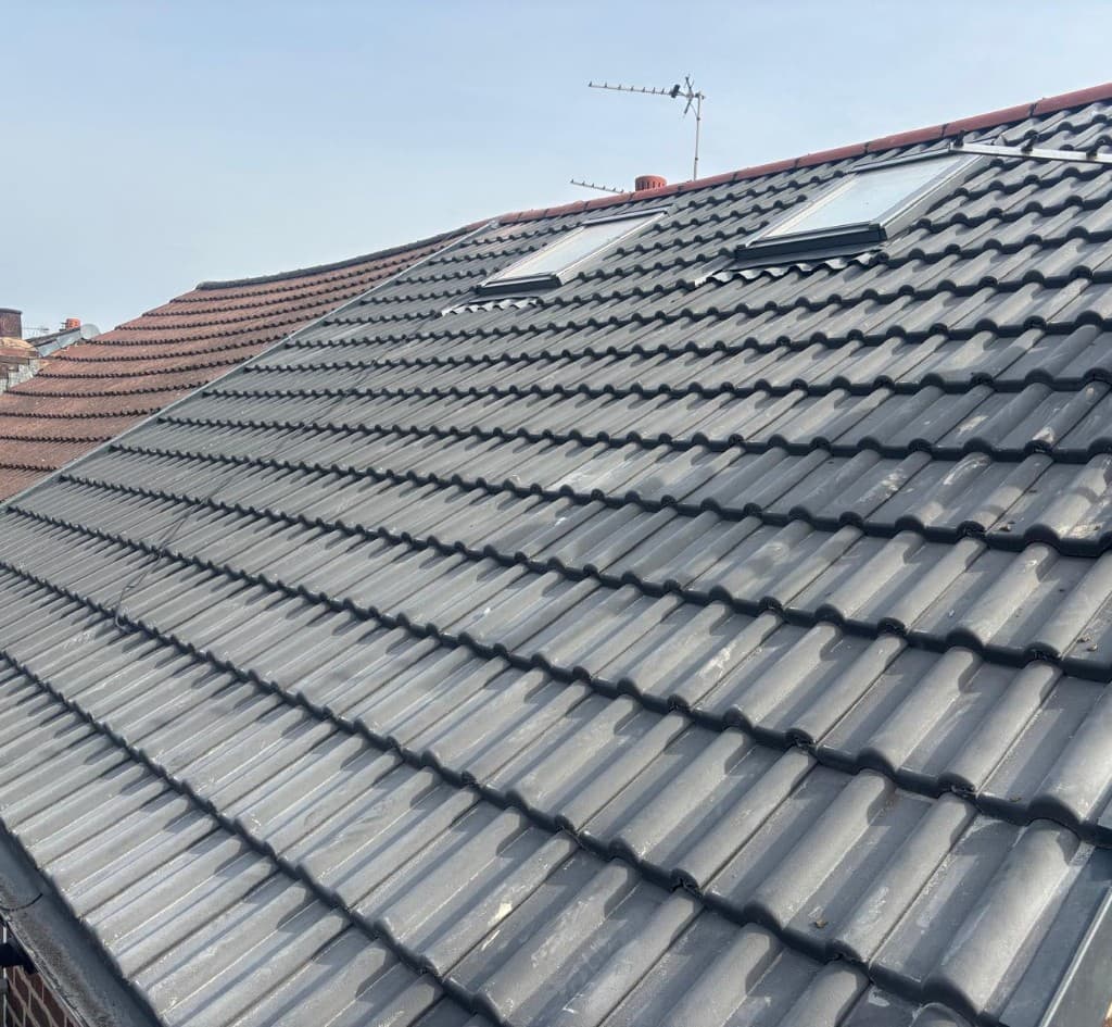 New tiled roof with skylights and dry verge installation by Cooper Roofcraft domestic roofer Bury Manchester